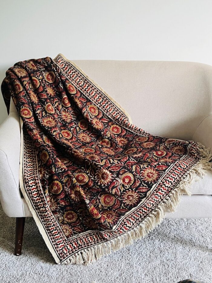 Rust floral throw blanket couch